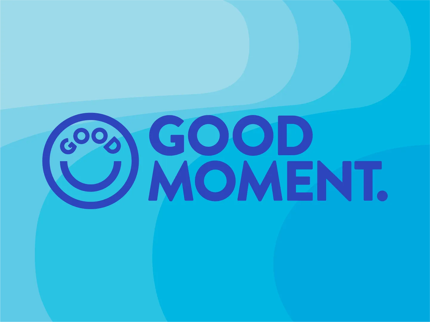 A mockup of the Good Moment logomark and brand identity.